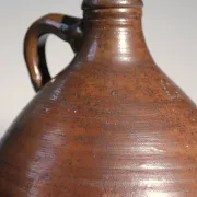 Brown stoneware jug with handle – 19th century