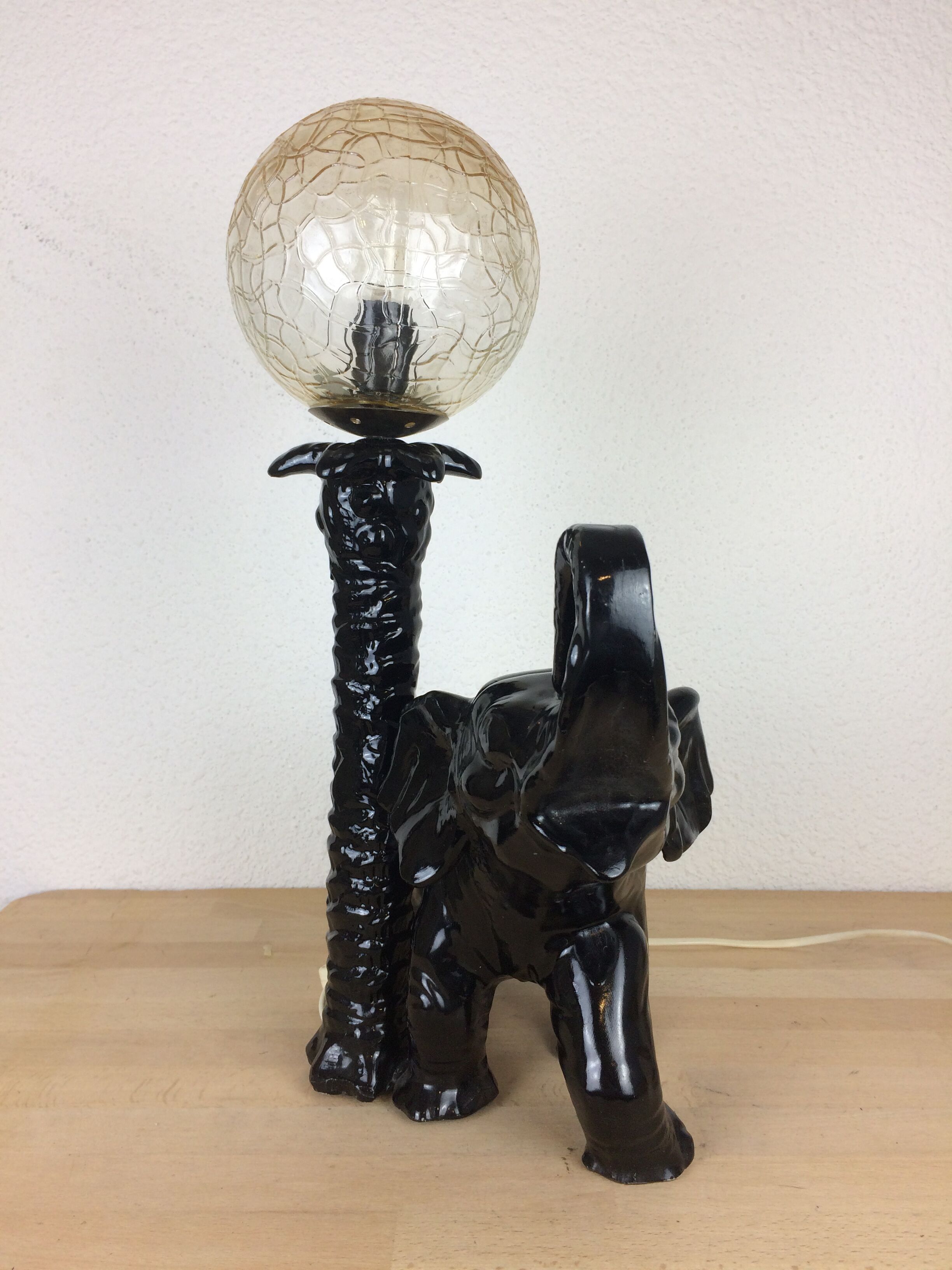 Elephant lamp and palm tree in black resin