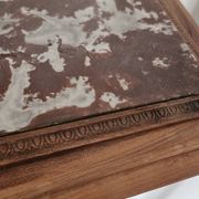 High plant stand in carved wood and Art Nouveau marble.