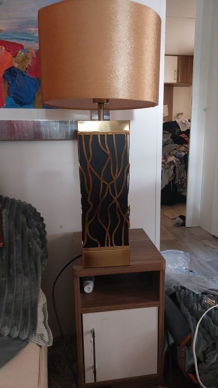 Golden and black lamp