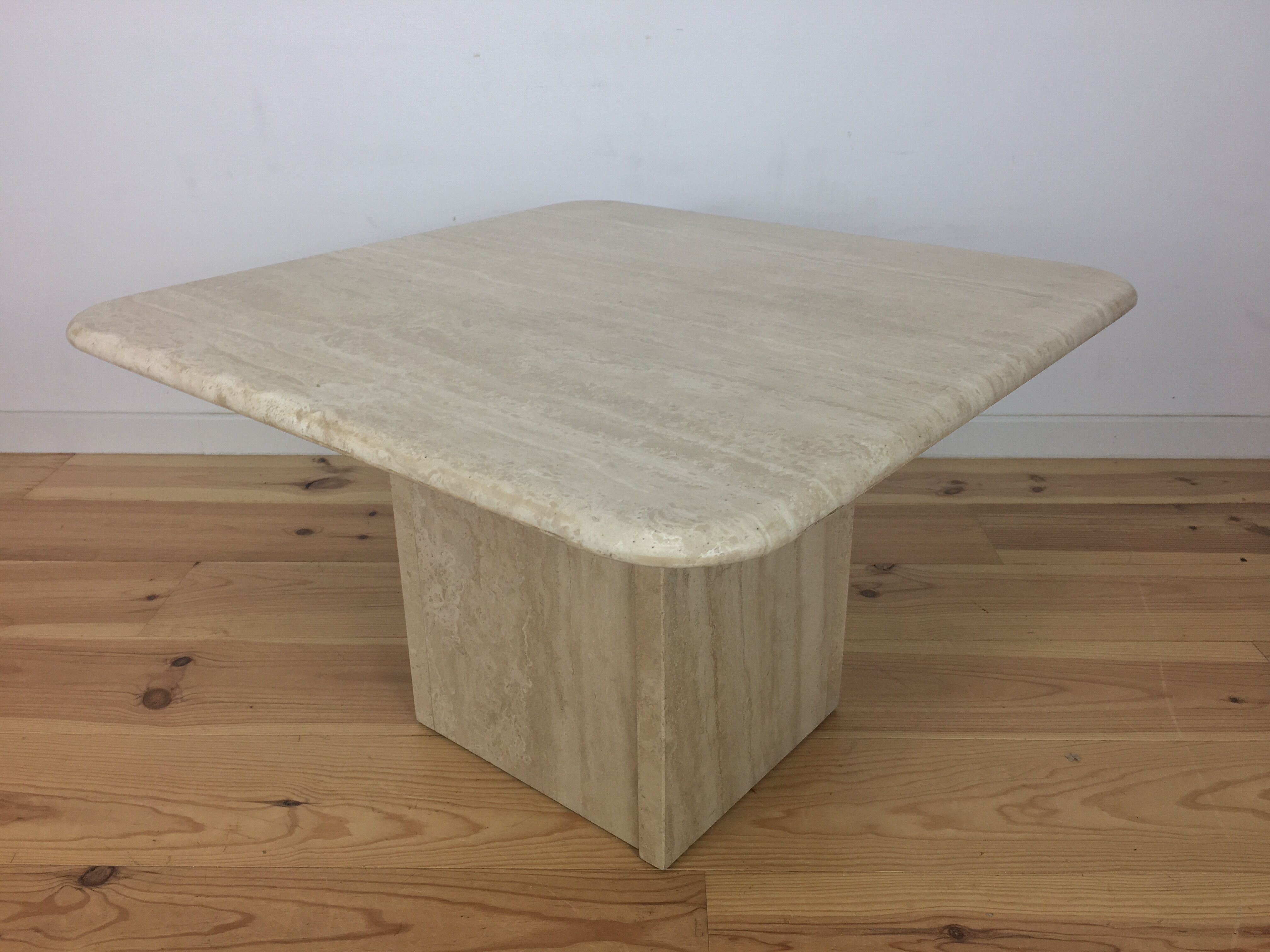 Square travertine coffee table