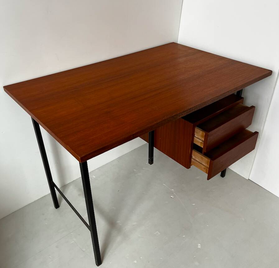 Vintage wooden and metal desk in modernist style.