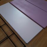 Pink string shelf with black uprights. 47x49x16