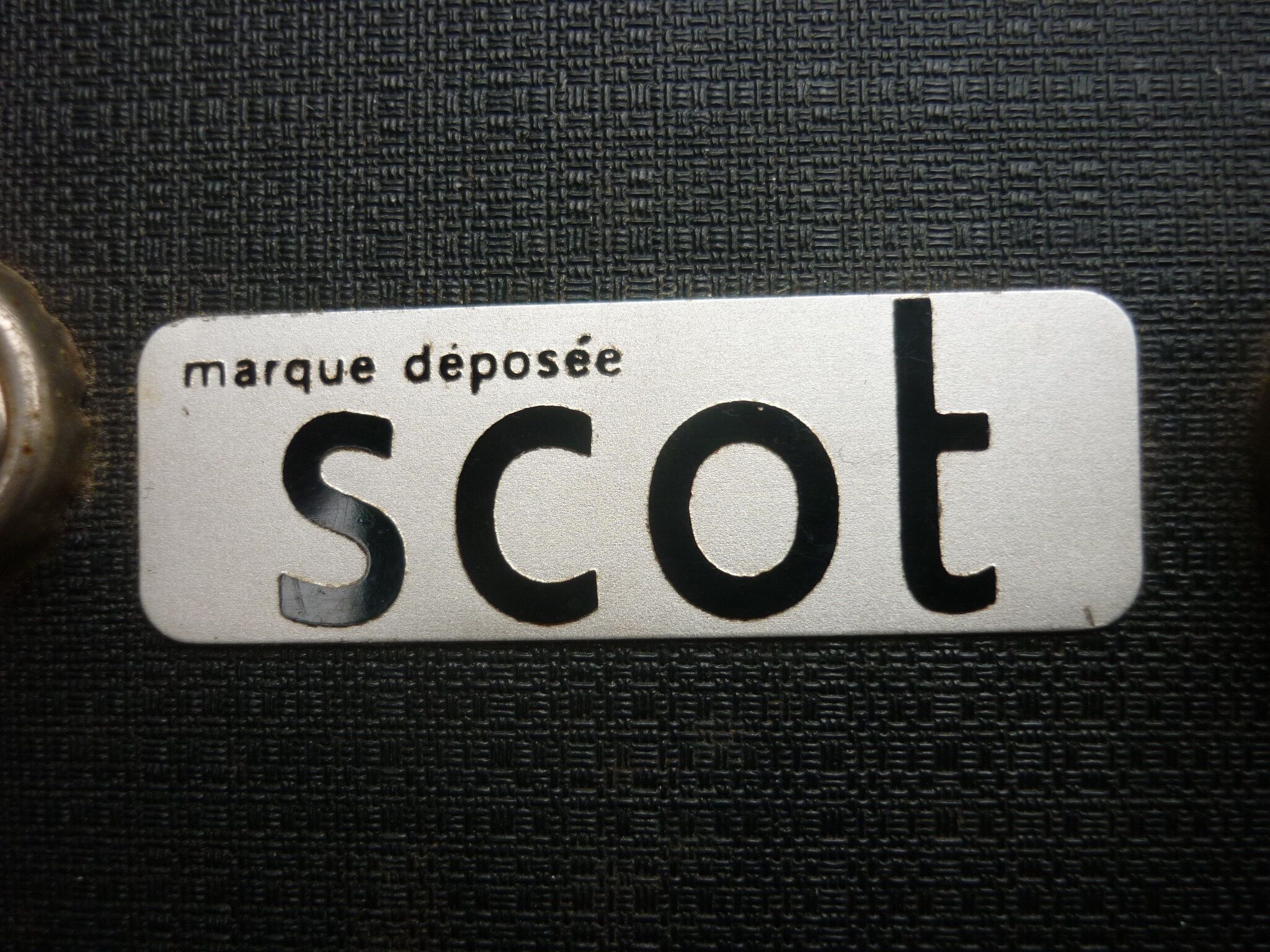 Black antique suitcase, registered trademark scot