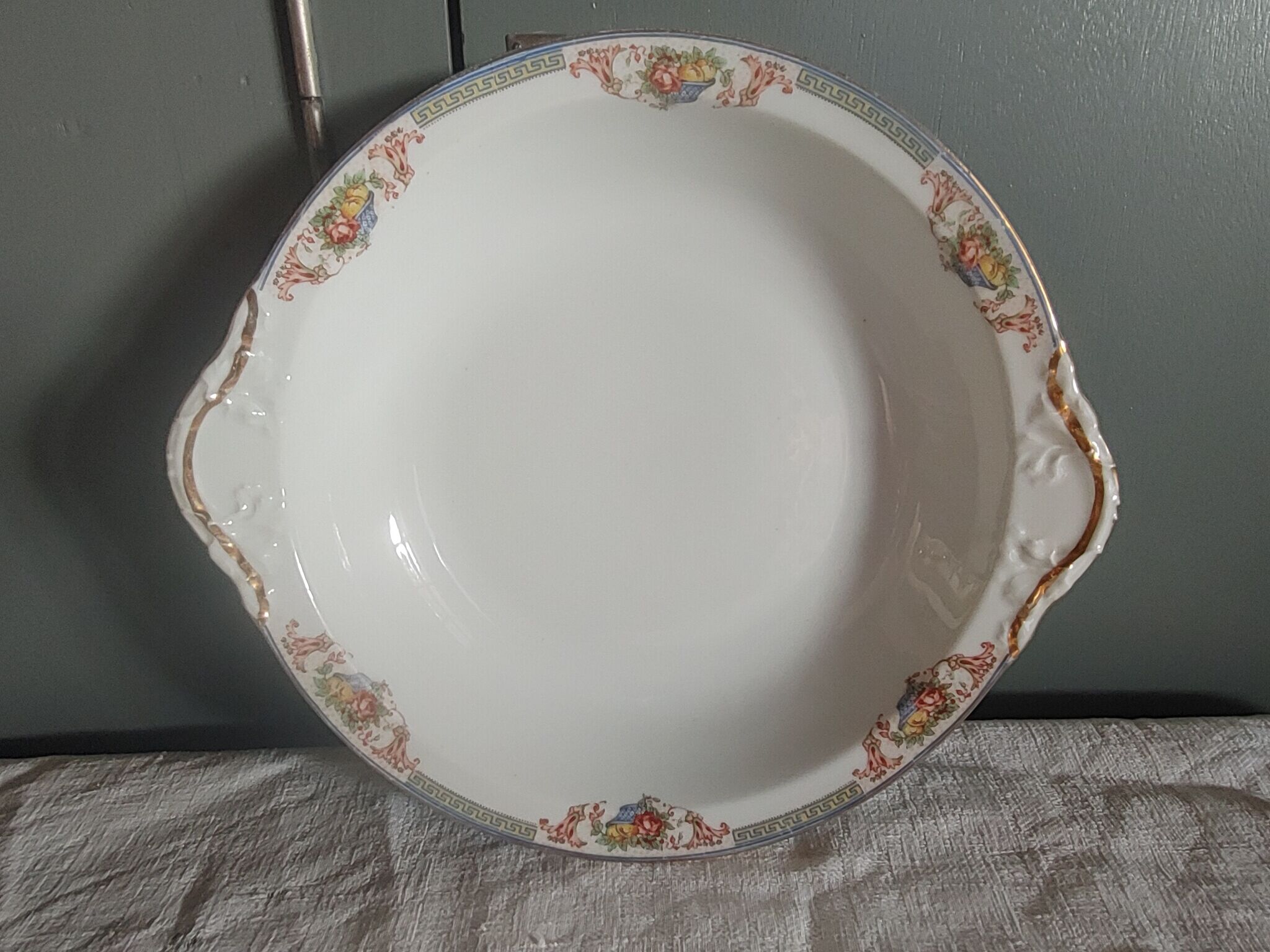 Hollow serving dish in limoges porcelain flower baskets, fruits - early 20th