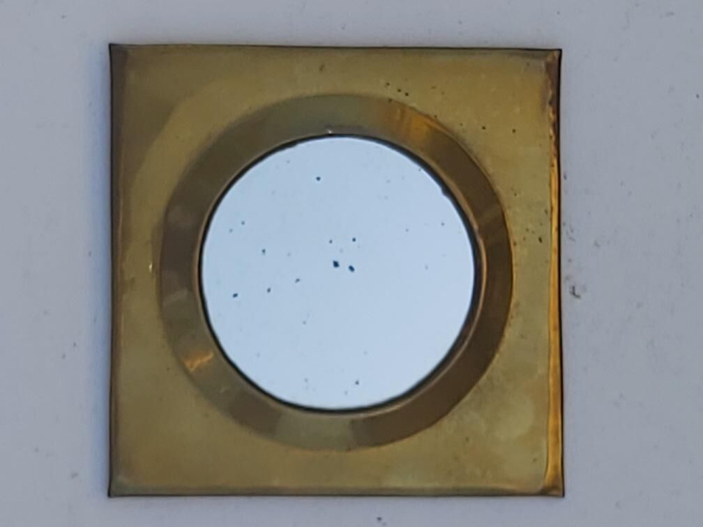 Set of 9 oriental brass mirrors