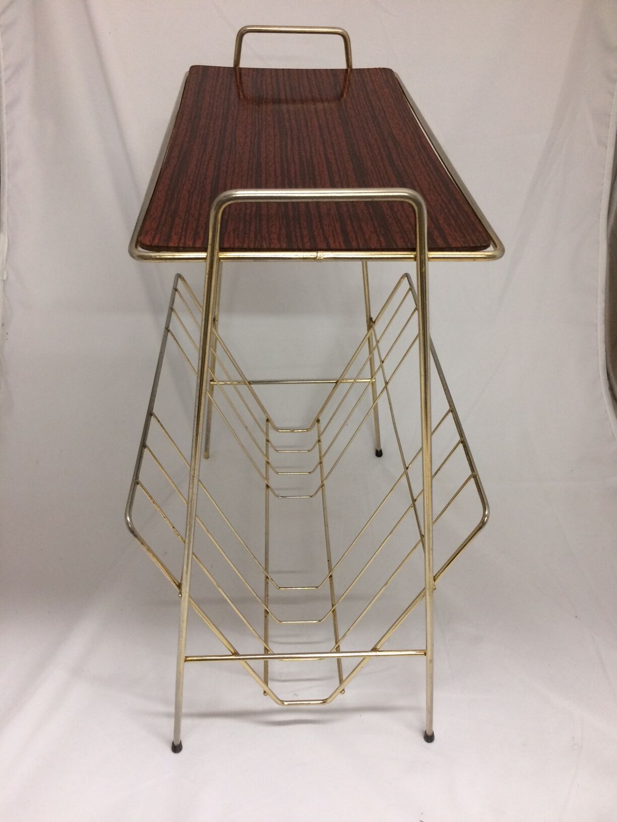 Metal magazine holder with vintage tablet