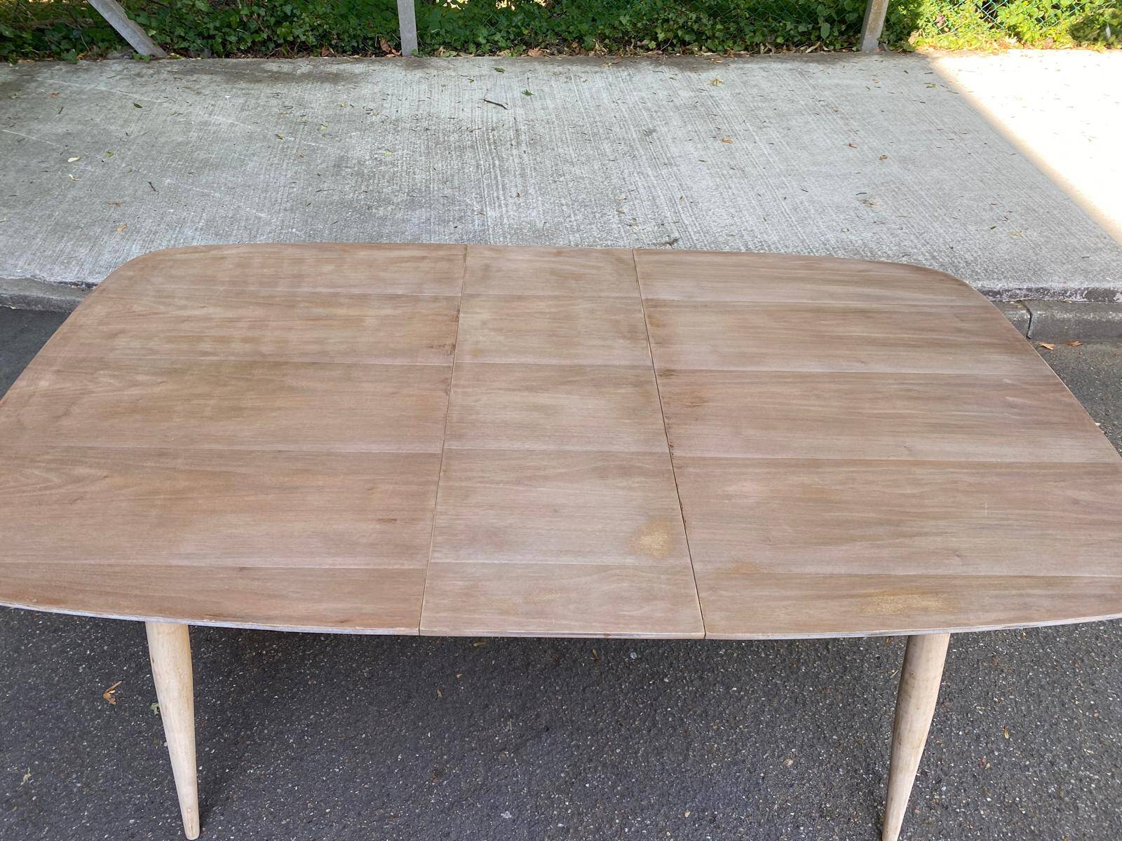 Renovated Scandinavian extendable dining table in teak and veneer from 1980.