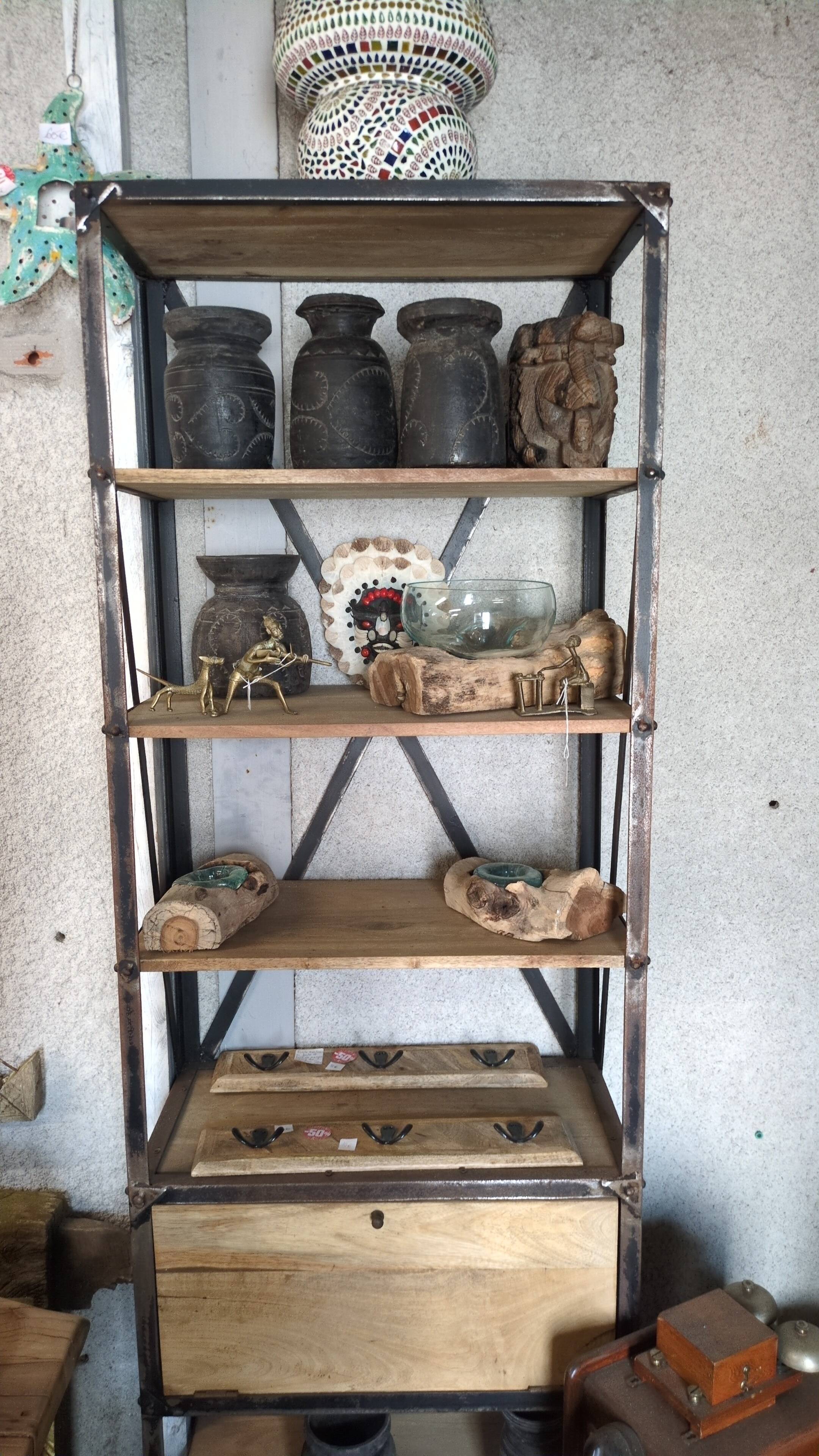 Industrial shelf made of solid exotic mango wood with riveted metal.