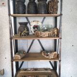 Industrial shelf made of solid exotic mango wood with riveted metal.