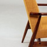 Vintage amber armchair Hermes designed by H. Lis