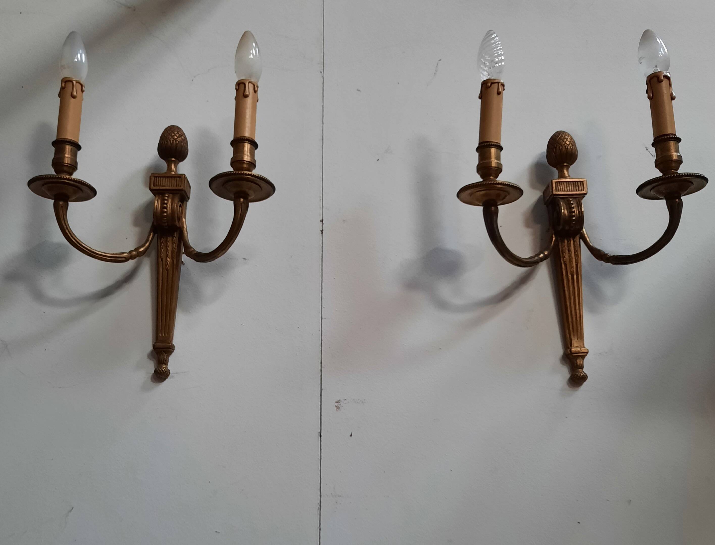 Pair of Louis XVI style bronze wall lights