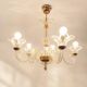Vintage chandelier in transparent glass and gilded brass, Murano style.
