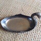 “Swan” pocket emptier