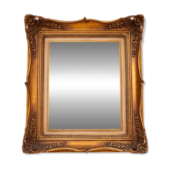 Mirror in gold frame, 1940s.