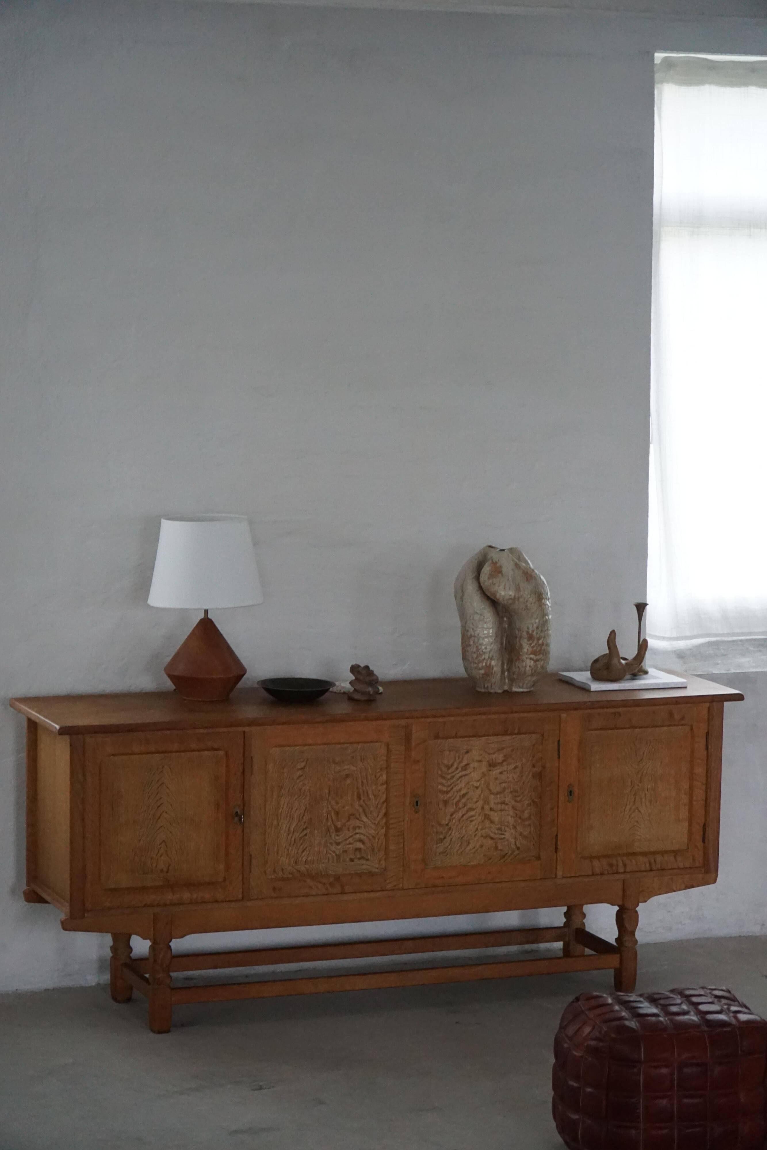 Low oak sideboard, mid-century modern, made by a Danish cabinetmaker, 1960s.