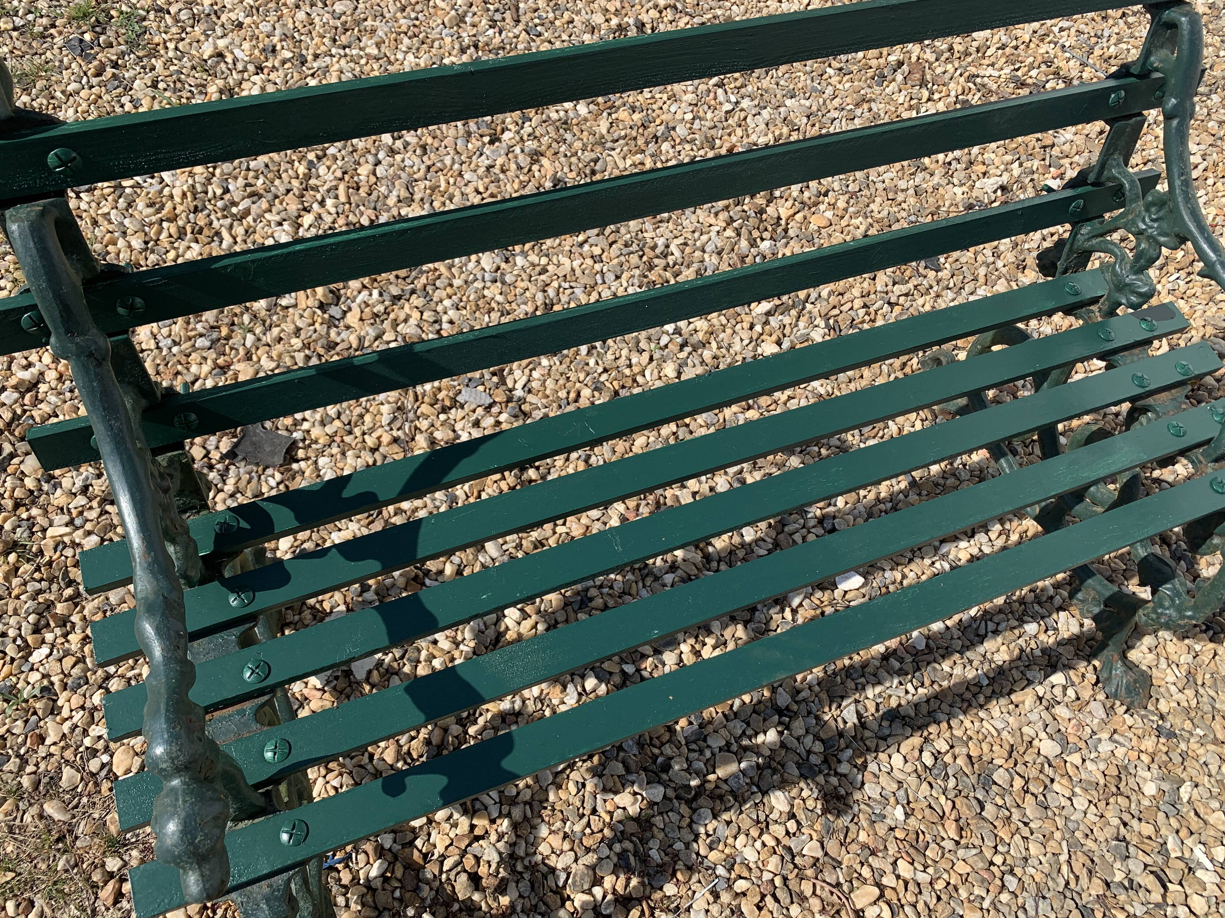 2-seat bench in wrought iron and wood