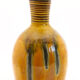 Saffron yellow enamelled earthenware vase with khaki green glazes from Meyssac, Corrèze
