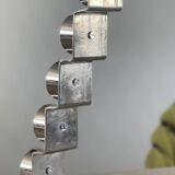 Chrome-plated metal candle holder