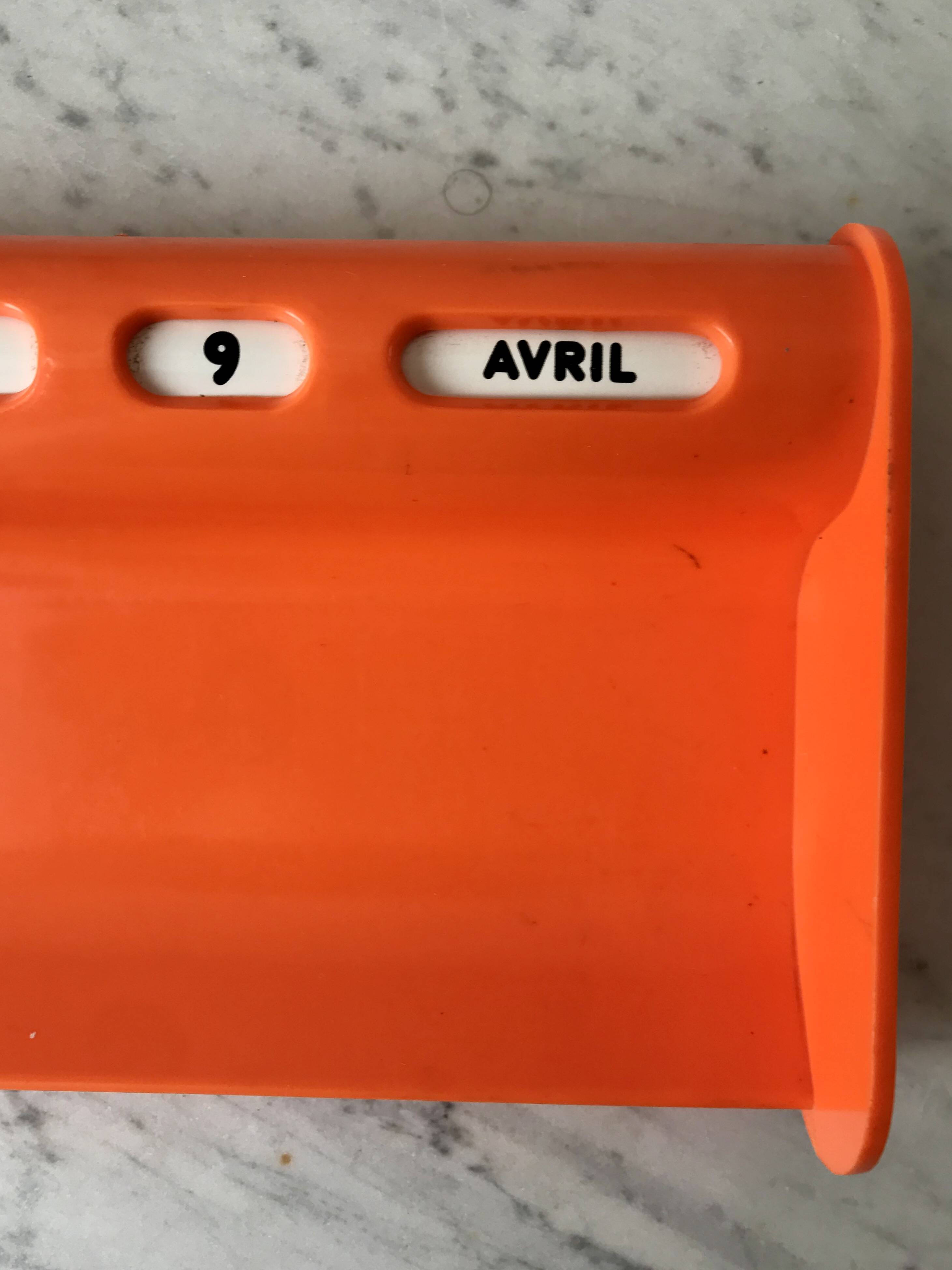 Dater empty pocket in orange plastic seventies 70s