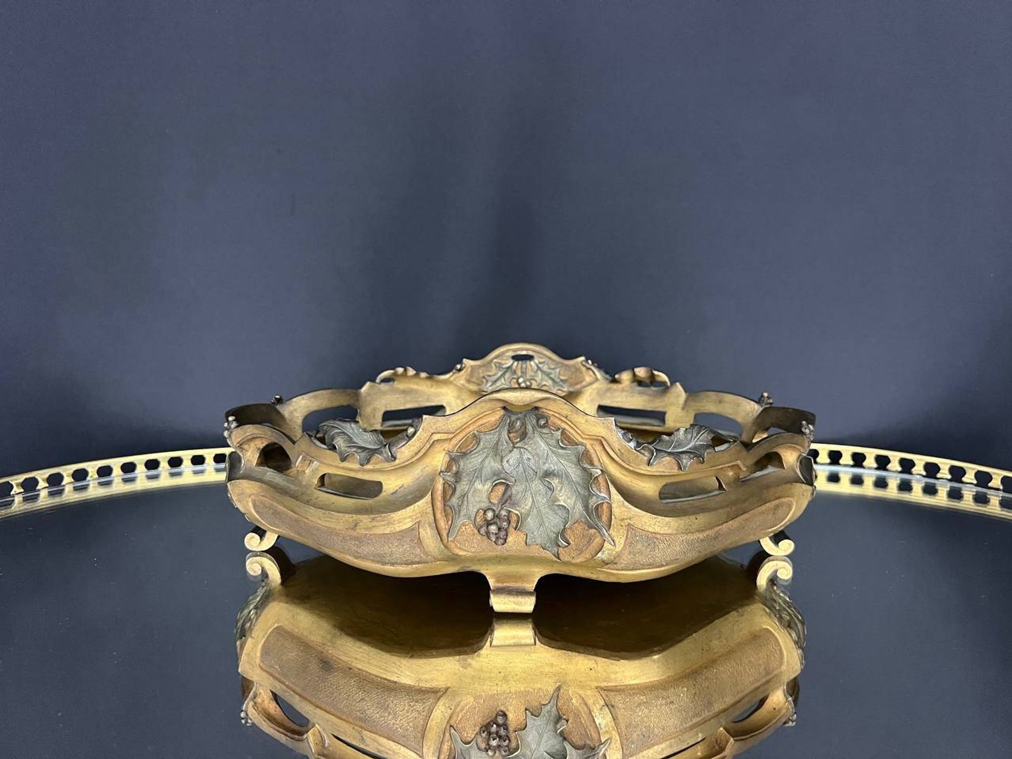 Art Nouveau jardinière in gilded bronze with holly decoration, signed E. Gros.