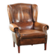 Wingback armchair made of sheepskin leather finished with decorative nails