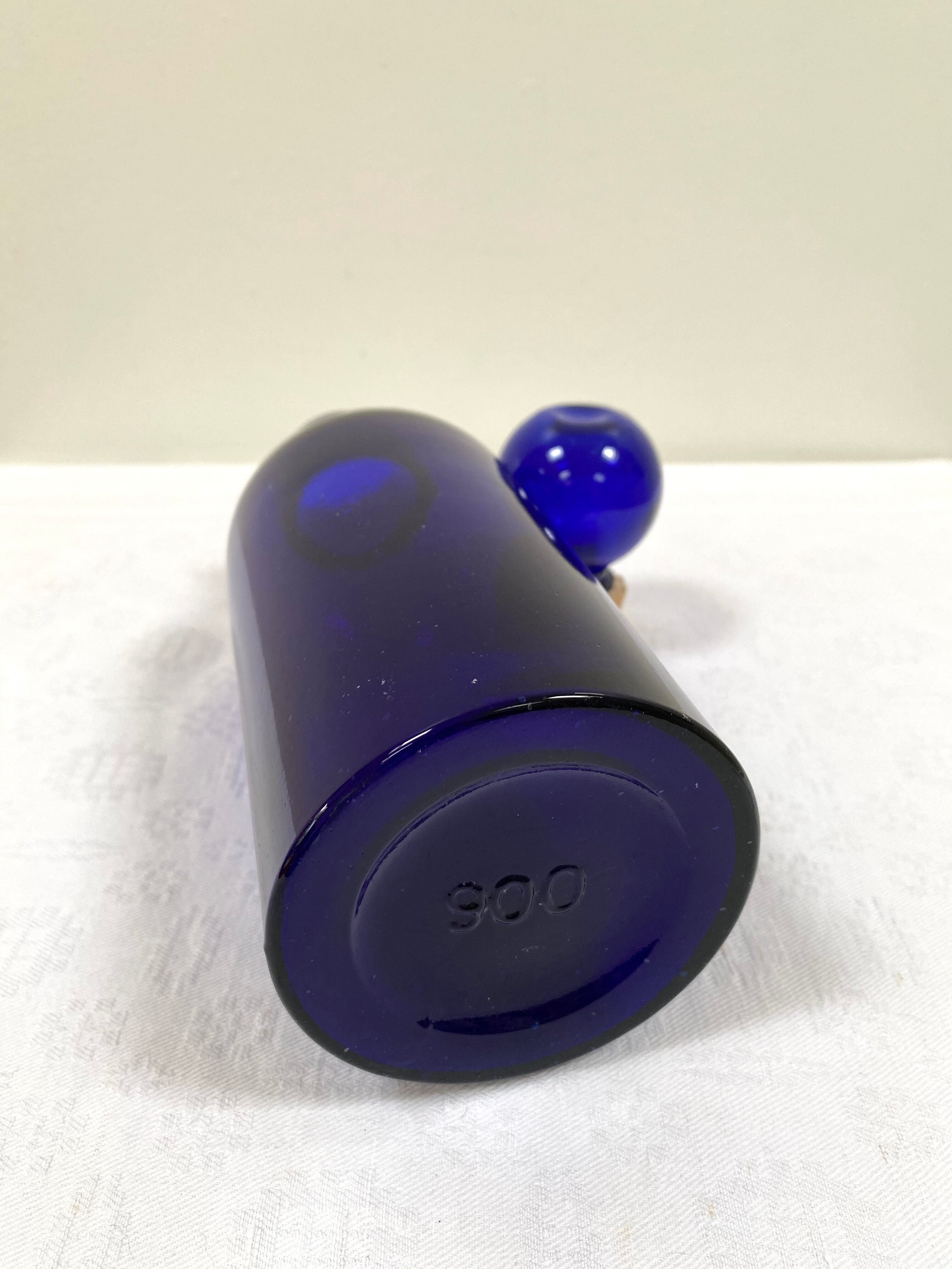 Old apothecary bottle in cobalt blue glass