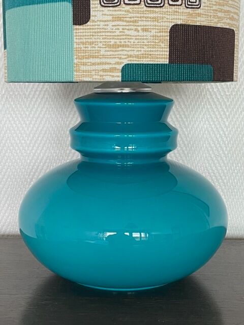 Blue opaline table lamp and vintage Maori fabric