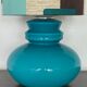 Blue opaline table lamp and vintage Maori fabric