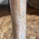 Pair of brass and stone candlesticks