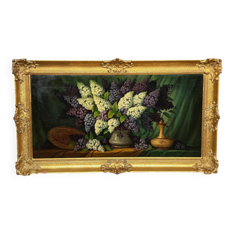 Tableau signé "Nature morte aux lilas".