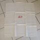 Lot de 14 serviettes blanches et anciennes avec initiales rouges