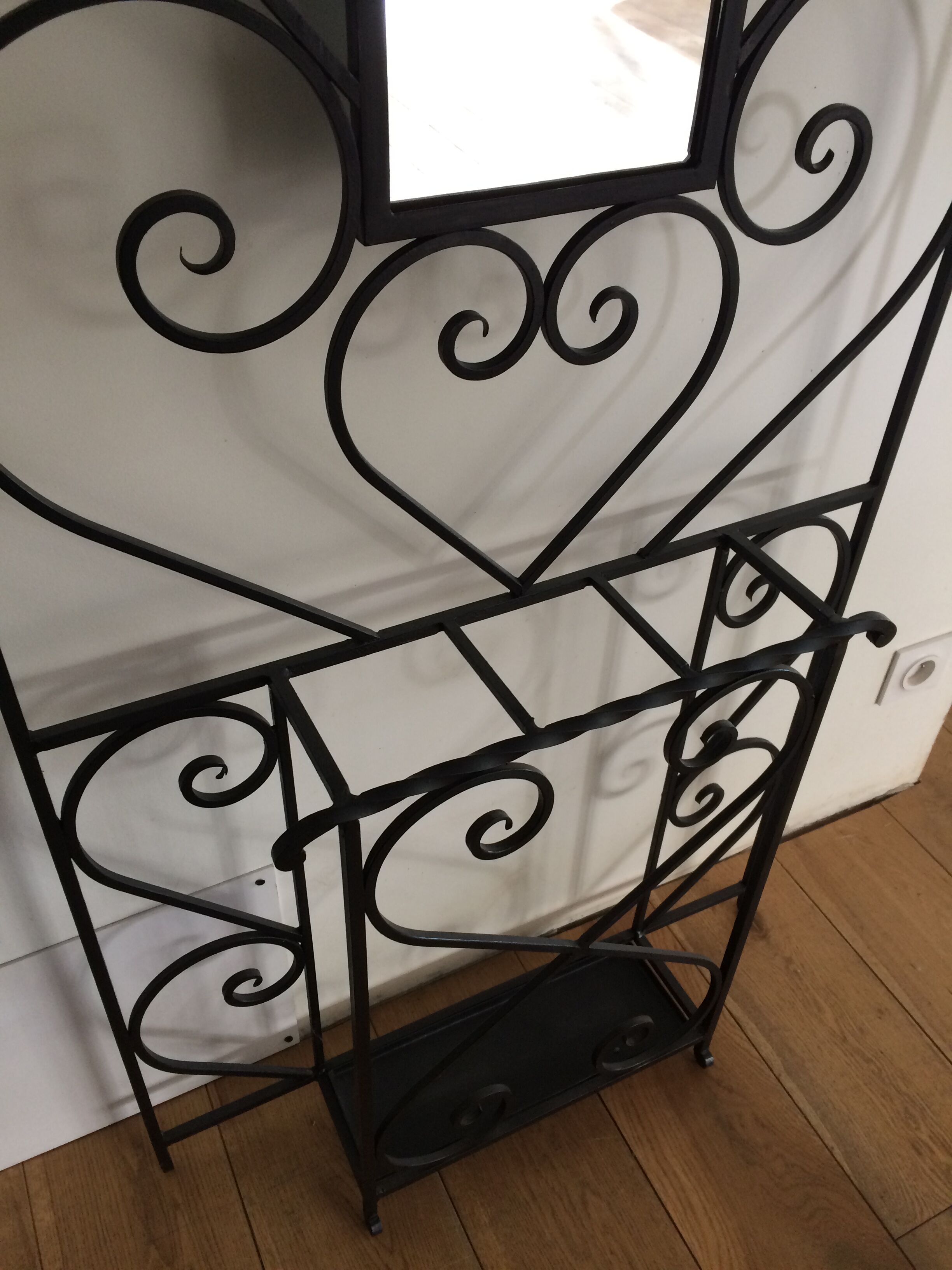 Wrought iron coat holder