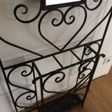 Wrought iron coat holder