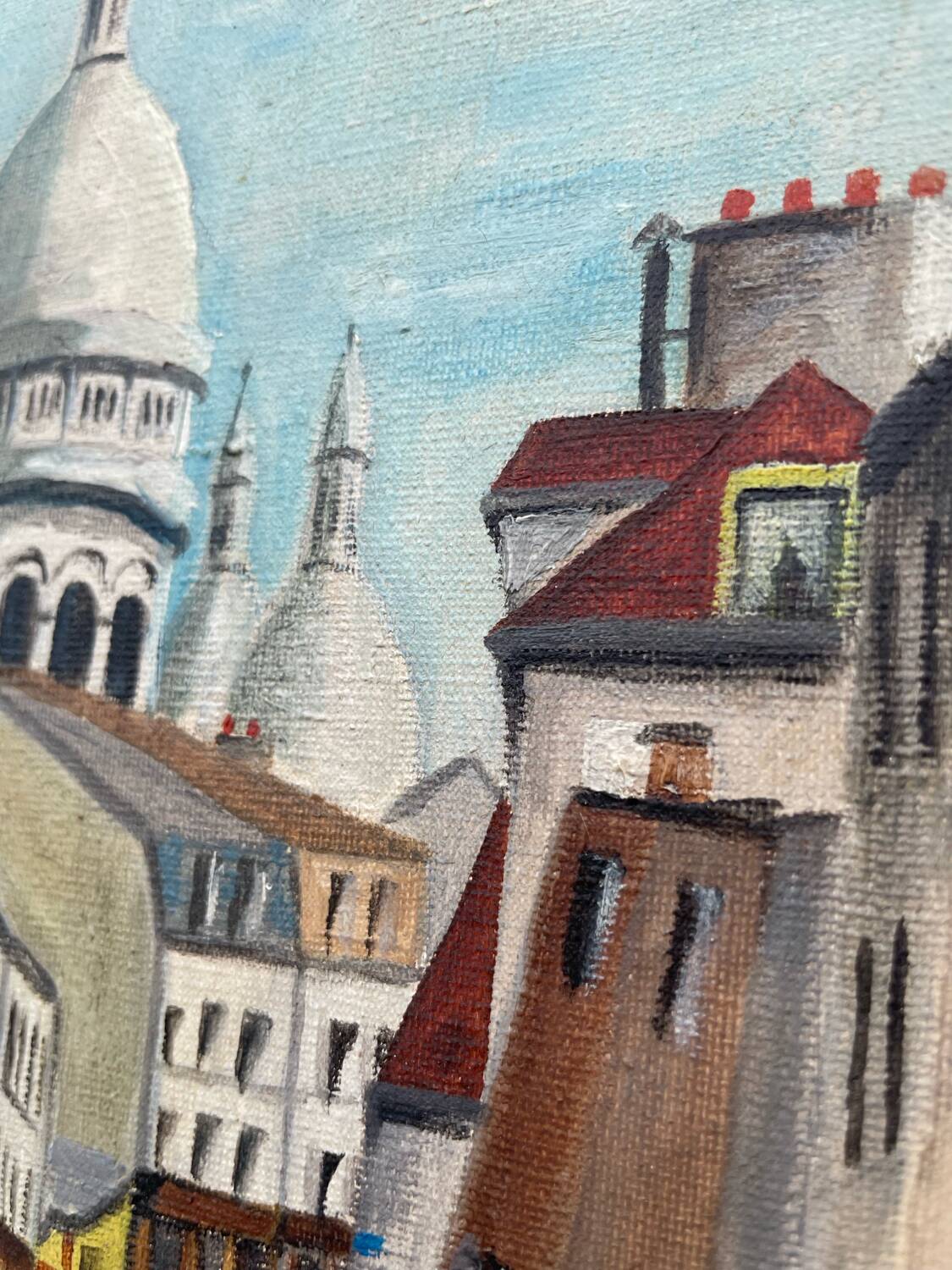 Old oil painting depicting a street in Montmartre
