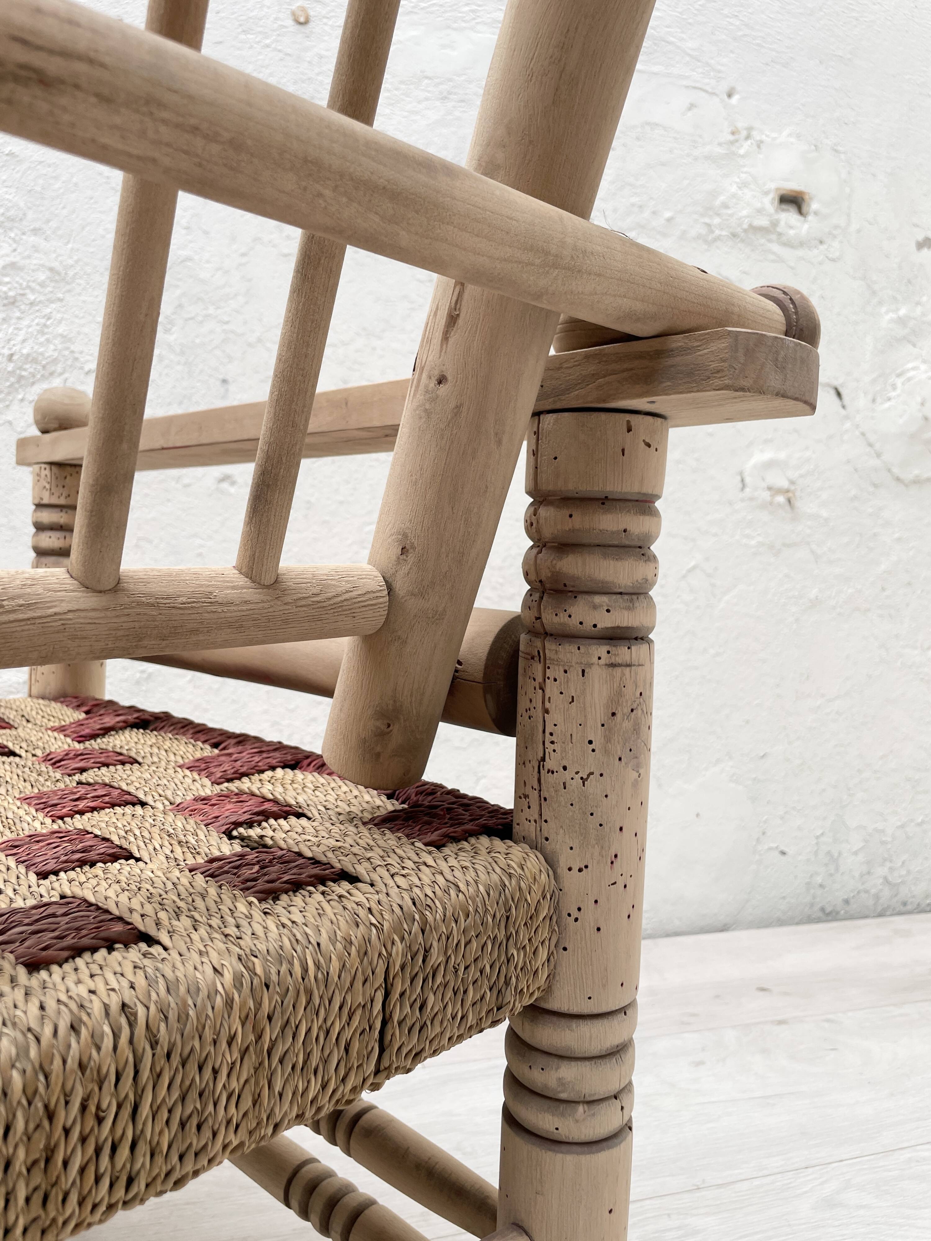 Pair of wooden armchairs and ropes