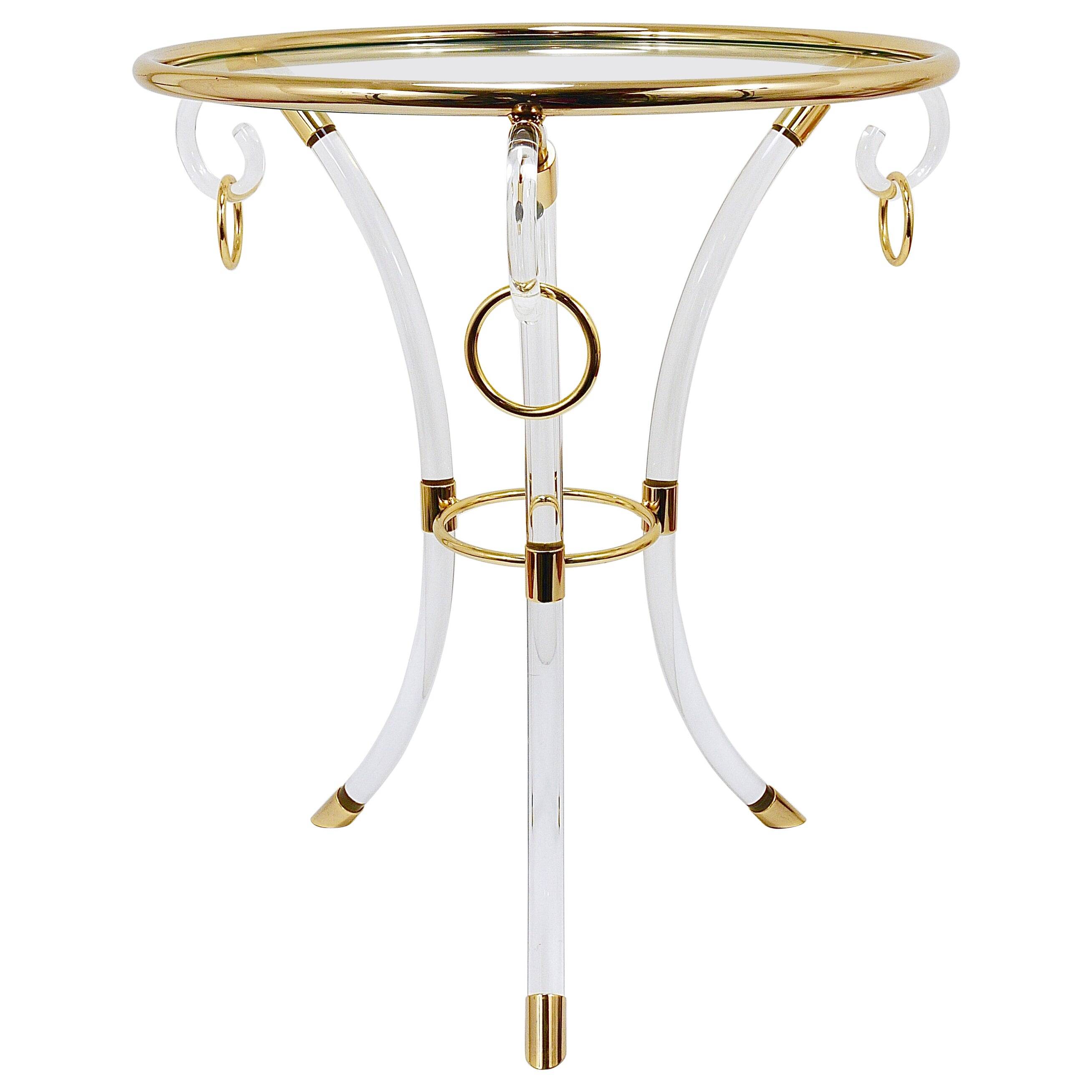 Table basse Tripode style Maison Jansen en lucite et métal doré