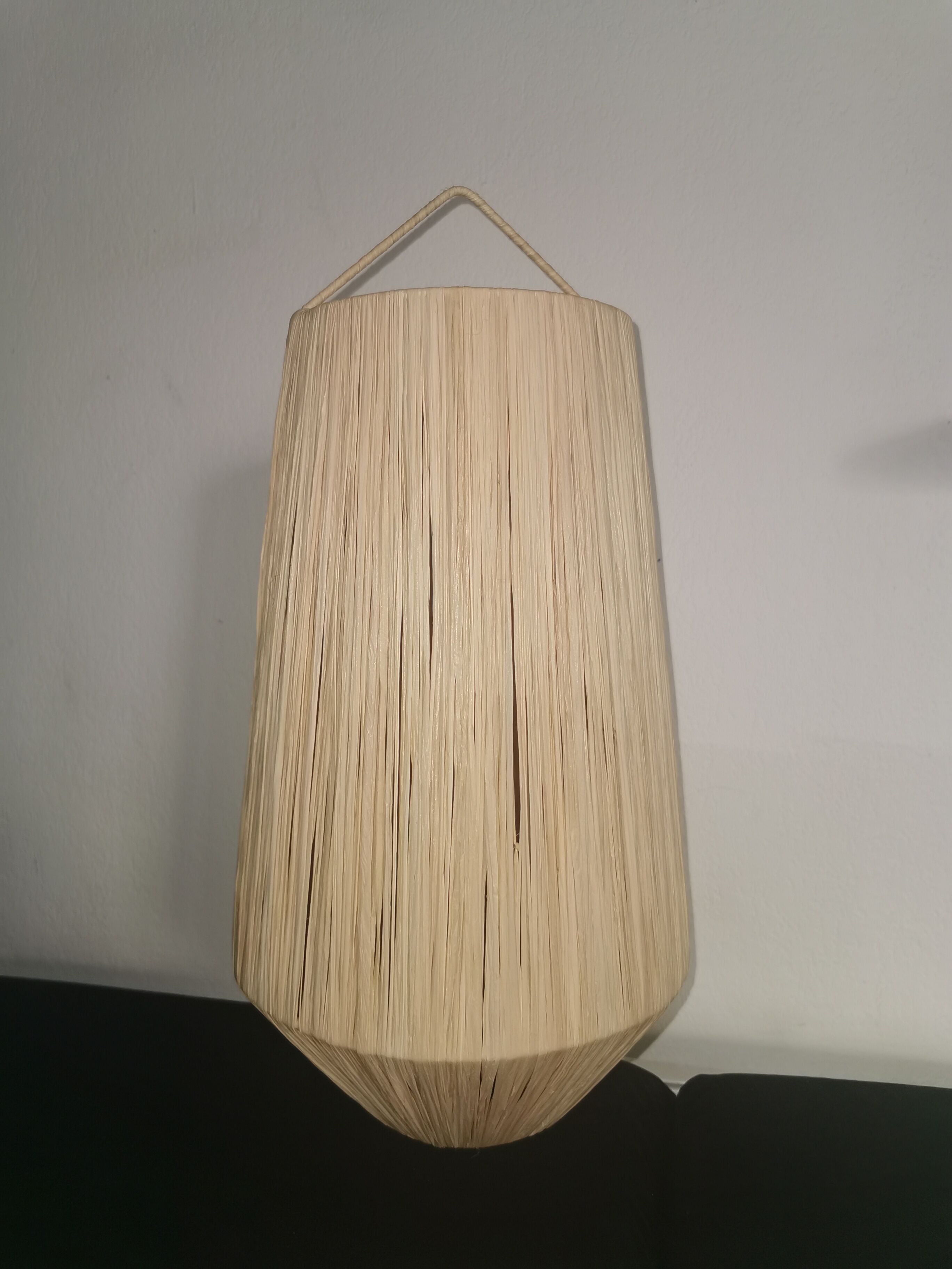 Hanging in natural raffia