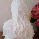 Plaster bust reading child