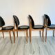 Lot de 4 chaises vintage "Pégase" – design Baumann, bois clair & skaï
