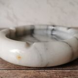 Ashtray and marble under glass