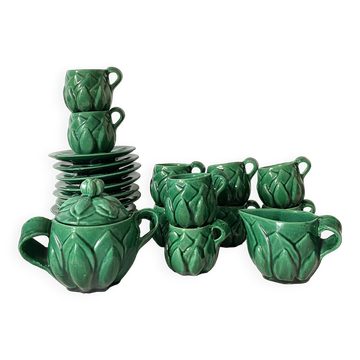 Antique slip cups with saucers, sugar bowl and milk pitcher