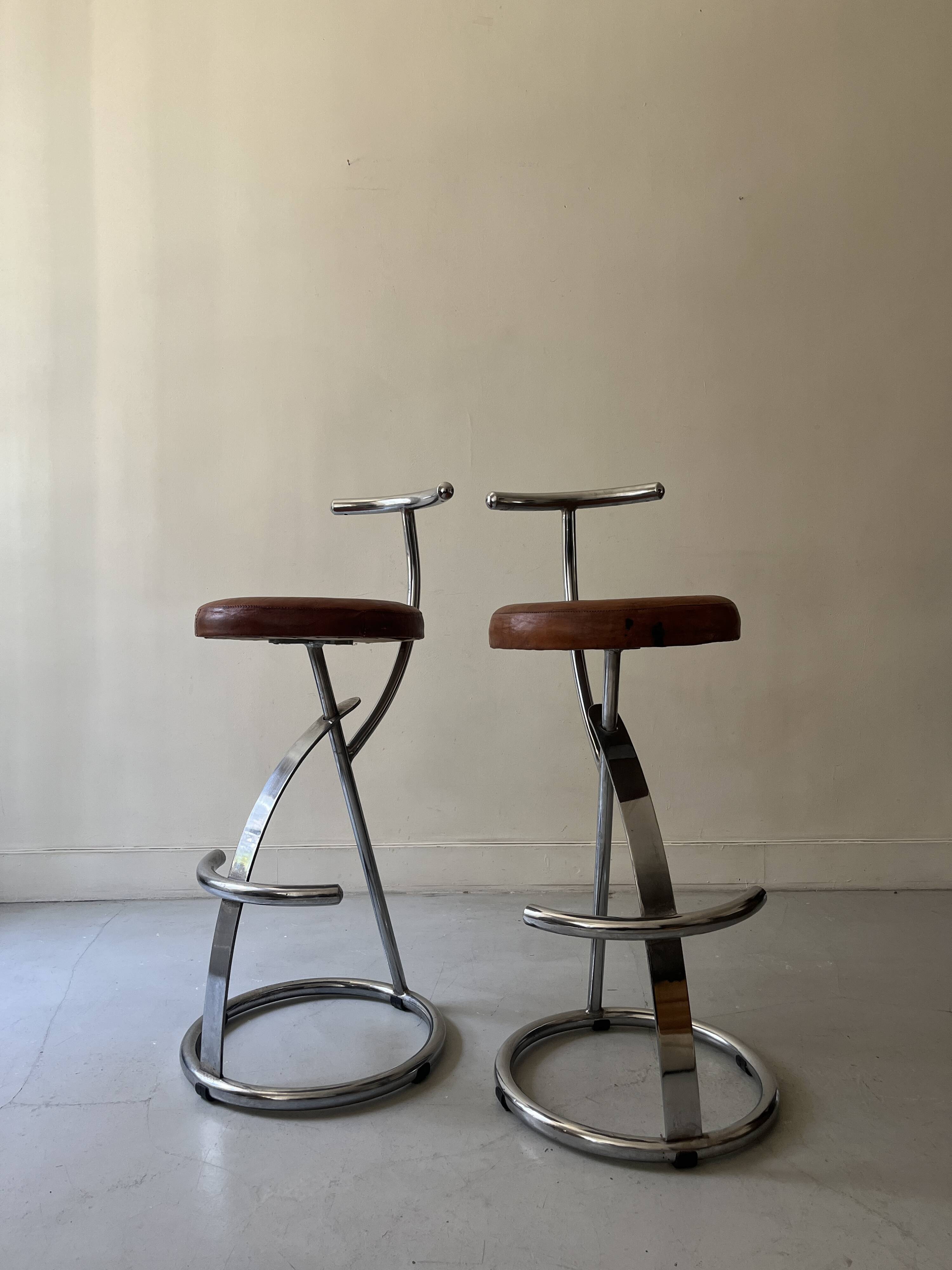 Bar stools in tubular chrome and tan leather, 1970s
