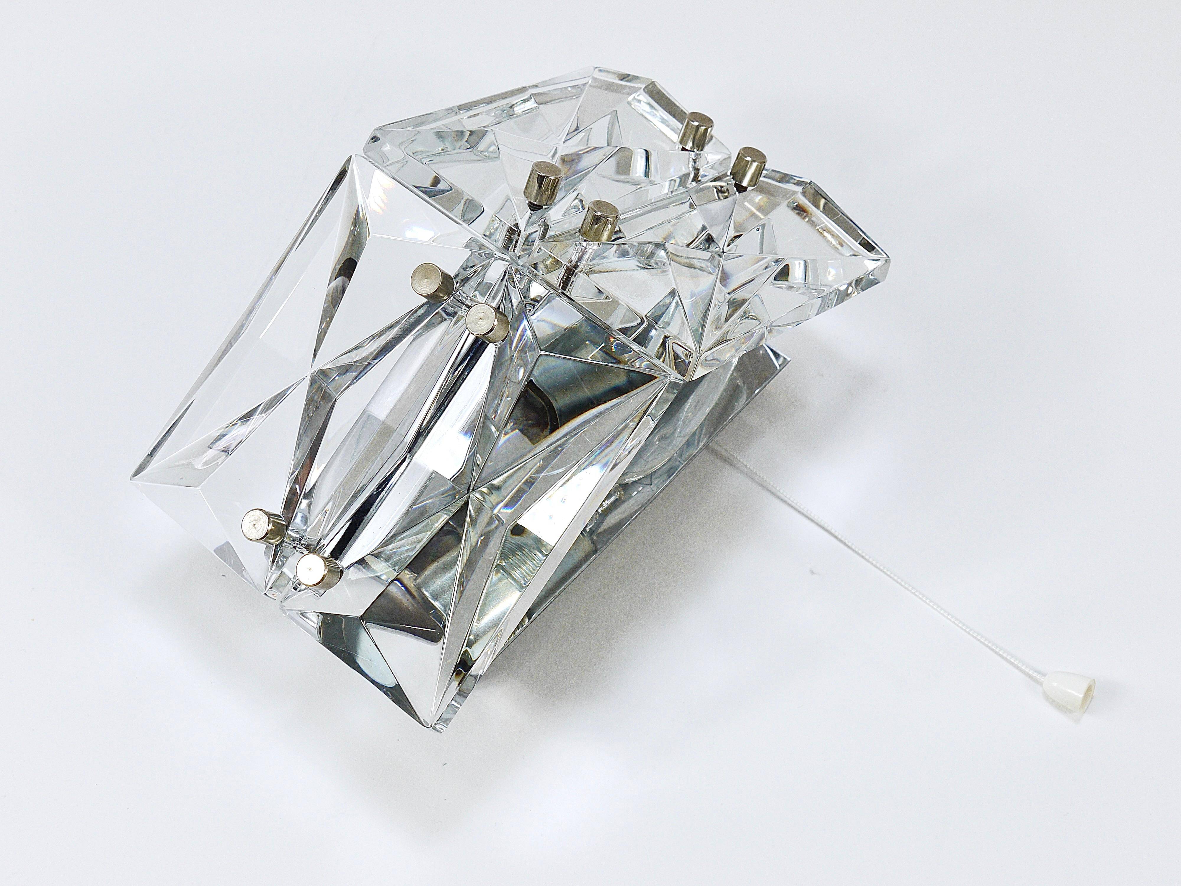 Pair of wall sconces in faceted crystal and chrome / prism glass wall lamps by Kinkeldey