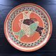 Large handmade dish with fish decoration