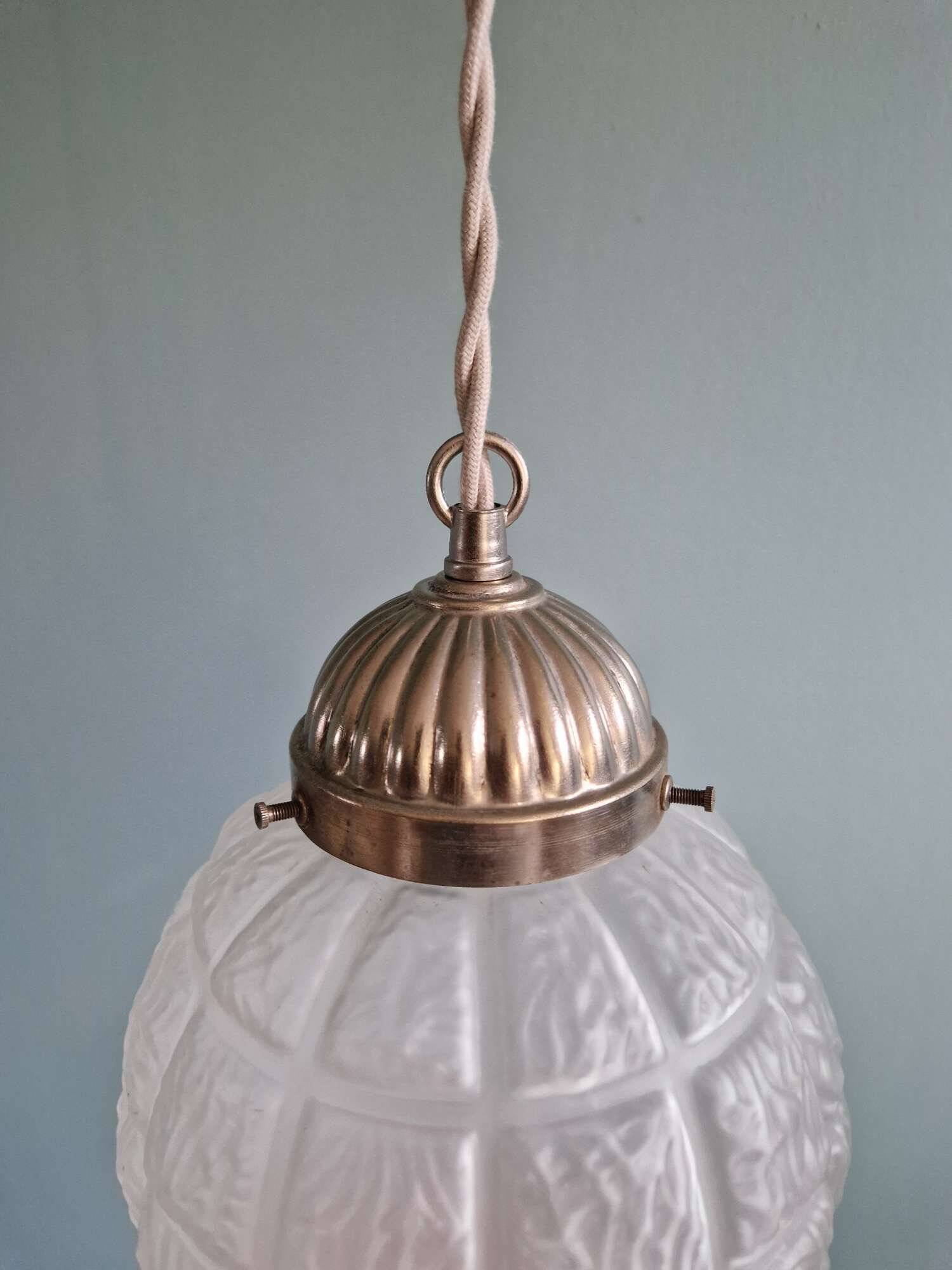 Art Deco trio of frosted glass pendants, 1920s-30s.