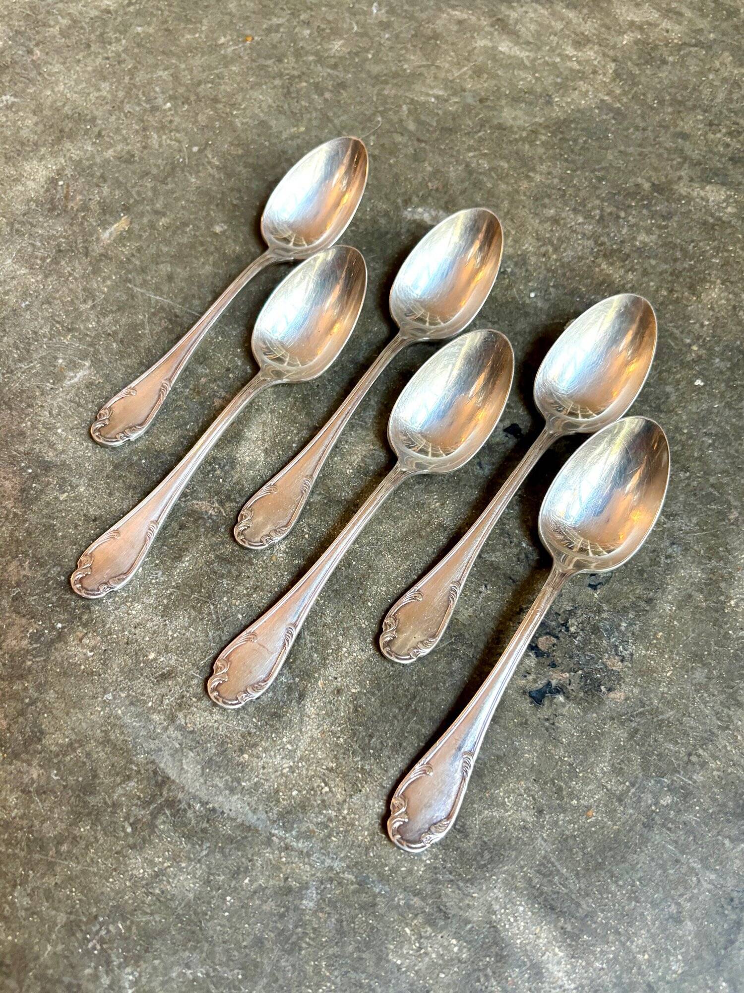 6 small silver metal spoons