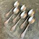 6 small silver metal spoons