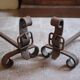 Brutalist cast iron fireplace grates in the shape of a belt, decor.