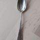 Series of 11 small silver metal spoons